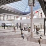 Modern airport terminal with travelers and retail shops in Cape Town.
