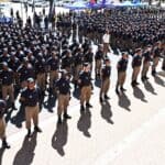 Large formation of uniformed police officers during a public event in Cape Town.