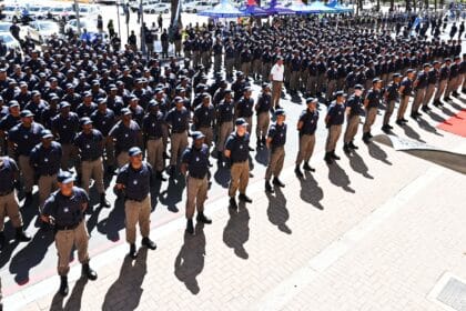 Large formation of uniformed police officers during a public event in Cape Town.