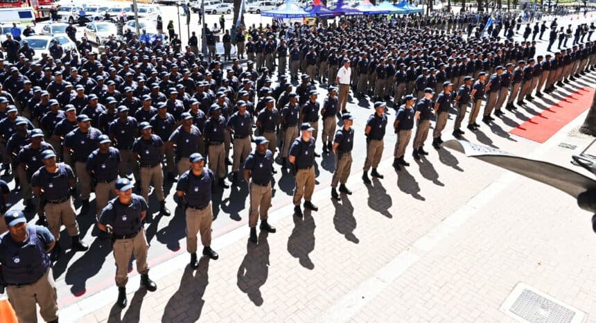 Large formation of uniformed police officers during a public event in Cape Town.